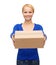 Smiling woman in casual clothes with parcel box