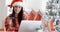 Smiling woman doing online Christmas shopping