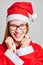 Smiling woman dressed like Santa for christmas