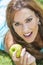 Smiling Woman Eating Apple With Perfect Teeth