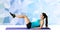 Smiling woman flexing abdominal muscles on mat
