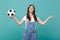 Smiling woman football fan support favorite team with soccer ball hold hands in yoga gesture, relaxing meditating
