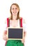 Smiling woman holding clean blackboard