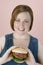 Smiling Woman Holding Hamburger