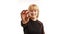 Smiling Woman Holding a Painkiller tablet, white background