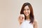 Smiling woman point finger at you, positive mood