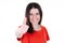 Smiling woman is pointing the thumb up while looking happy blurred girl portrait