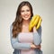 Smiling woman portrait with vitamin diet food banana.