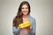 Smiling woman portrait with vitamin diet food banana.