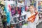 Smiling woman seller advising on leashes for pets