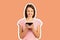Smiling woman sending a sms on cell phone. emotional girl Magazine collage style with trendy color background