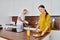 smiling woman serving tasty breakfast while