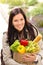 Smiling woman shopping vegetables groceries paper bag