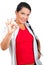 Smiling woman showing okay sign hand