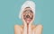 Smiling woman spa mask, beauty concept healthy portrait. Mud facial mask, face clay mask spa. Beautiful woman with