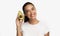 Smiling Woman Standing Holding Avocado, Studio Shot