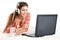 Smiling Woman use Laptop in Headphone. Young Girl work on Computer at Home. Happy Student Study in Earphone lying down