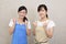 Smiling women in apron