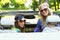 Smiling women in a cabrio