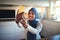 Smiling young Arabic woman taking a selfie in her kitchen