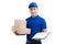 Smiling young asian salesman with parcel and clipboard against a