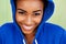 Smiling young black woman with blue sweatshirt