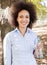 Smiling Young Black Woman Hold Bottle Of Water In Nature