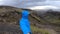 Smiling Young hiker near green canyon in Iceland. Fimmvorduhals hiking trail