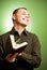 Smiling young man with book