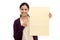 Smiling young Woman holding blank wood sheet