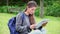 Smiling young woman studying