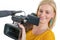 smiling young woman in yellow t-shirt with professional camcorder, on white