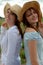 Smiling young women in cowboy hats