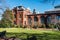 Smithsonian Castle in autumn. Absolutely clear skies and yellowed foliage of gardens