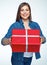 Smling woman hold big gift box.