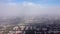 Smog over the city. Aerial view of smog. Cities and industrial smoke clouds the sky. Air pollution