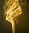 Smoke art with pure golden and yellowish coloured and with light yellow & black background