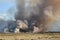 Smoke billowing from a grassland fire on a farm near Worcester