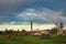 Smoke billowing from industrial smokestacks at factory or plant