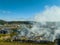 Smoke from controlled burn rises off small farm in rural area