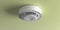 Smoke detector on ceiling.  Fire safety equipment. 3d illustration