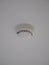 Smoke detector on white celling