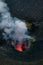 smoke from the erupting volcano on the island of Stromboli