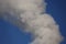 Smoke from a factory chimney releases air pollution and greenhouse gases