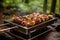 smoke-infused venison kebabs on a portable grill