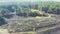 Smoke over forest, wild fire aerial view. Scorched earth and tree trunks after a spring fire in forest