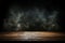 Smoke rises from dark wooden table against a shadowy backdrop