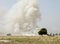 Smoke rises into the sky in rural South Sudan. People burn the land to renew it