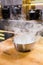 Smoke vapor dry ice in bowl in kitchen