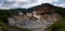 Smoke vents escaping from the earthâ€™s surface in Hell Valley Jigokudani